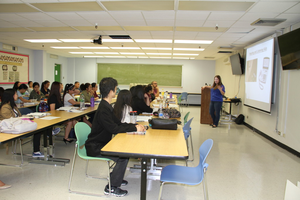 Photo of Carla Torres presenting at the School of Nursing.