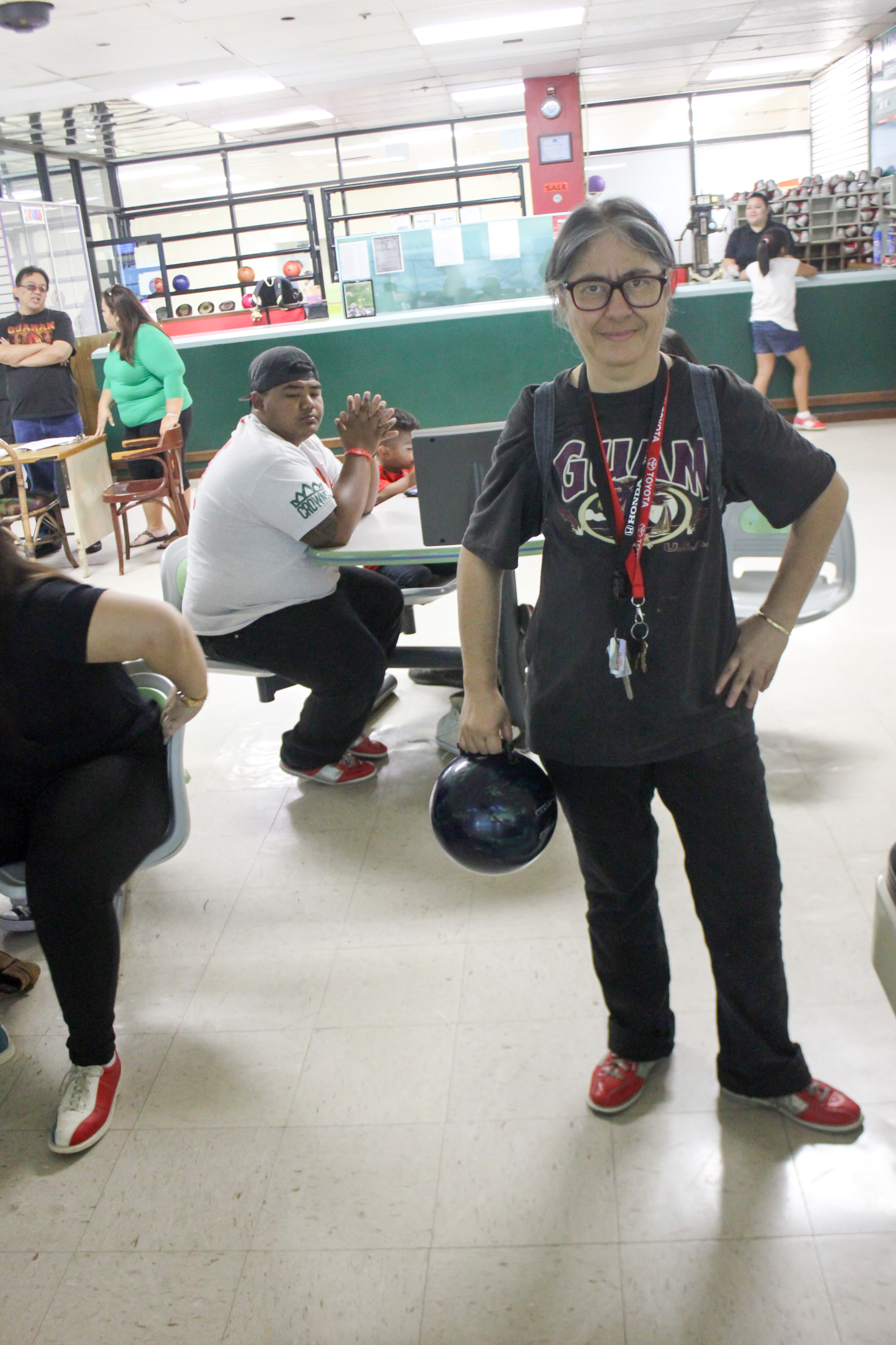 Barbara Johnson tests a grip bowling ball during the Bowling Bash at Central Lanes. 