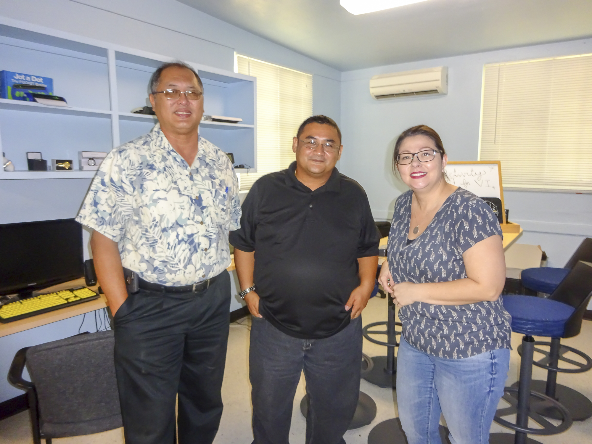 Representatives from the Northern Marianas College University Center for Excellence on Developmental Disabilities (NMC UCEDD) visited the GSAT AT Center on Monday, June 6. Pictured from left to right: Vince Merfalen, NMC Community Development Institute Director; Floyd Masga, Director, NMC UCEDD; and Carla Torres, ATP, AT & Special Projects Program Coordinator.