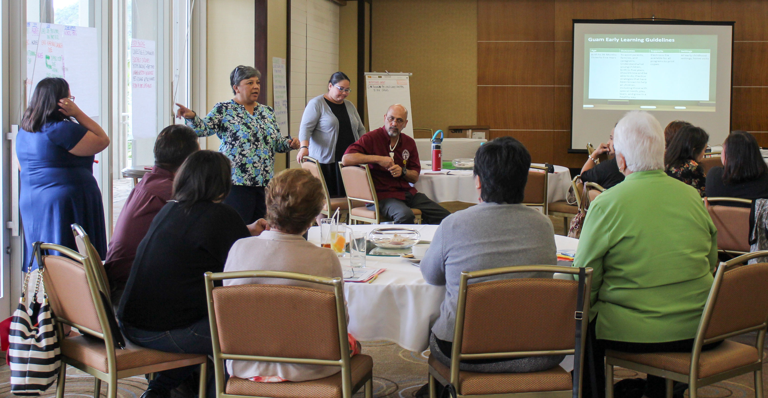 Elaine Eclavea, Guam CEDDERS Consultant, and Vera Blaz, Project Tinituhon Project Coordinator, facilitate mapping of early childhood initiatives under Project Tinituhon with Strategic Management Team members on Wednesday, June 22 at the Westin Resort. 
