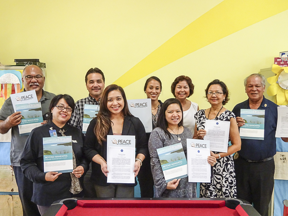 Members of CLASP (Culture and Language Access Services Partners) hold up documents reflecting key accomplishments reached by the coalition (CLASP was formed in 2013 to promote awareness about Language Access Services). Among the documents shown are: a) a copy of the Executive Order signed by the governor requiring all government entities including boards and commissions to develop Language Access Plans to address the language needs of its organizations as required by federal mandates and Culturally and Linguistically Appropriate Services (CLAS) Standards in Health and Health Care; b) a copy of “Beyond Mandates: Language Access Services in Guam,” a publication by UOG CEDDERS outlining the significance of LAS as a strategy to address disparities in services. The publication also documents local efforts to address language equity across the system of services on Guam; and, c) the PEACE Council packet with a cover letter from the Council that will be disseminated to all organizations informing them of the Executive Order and the resources available to help comply with the Executive Order. Front Left to Right:  Tisha Flores, DYA; Dorothy Manglona, GCC; Kirsten Rosario, GCC; Back Left to Right:  Alex Silverio, DPHSS-GOMH; Ignacio Guerrero, GBHWC; Leilani Duenas, GCC-AHEC; Mariles Benavente, UOG CEDDERS-Project Karinu; Maria Perez, GMHA; Peter Alexis Ada, DYA. The next quarterly CLASP meeting will be held in February 2017. Please call any of the members shown above for more information about CLASP and/or about the Executive Order No. 2015-015.