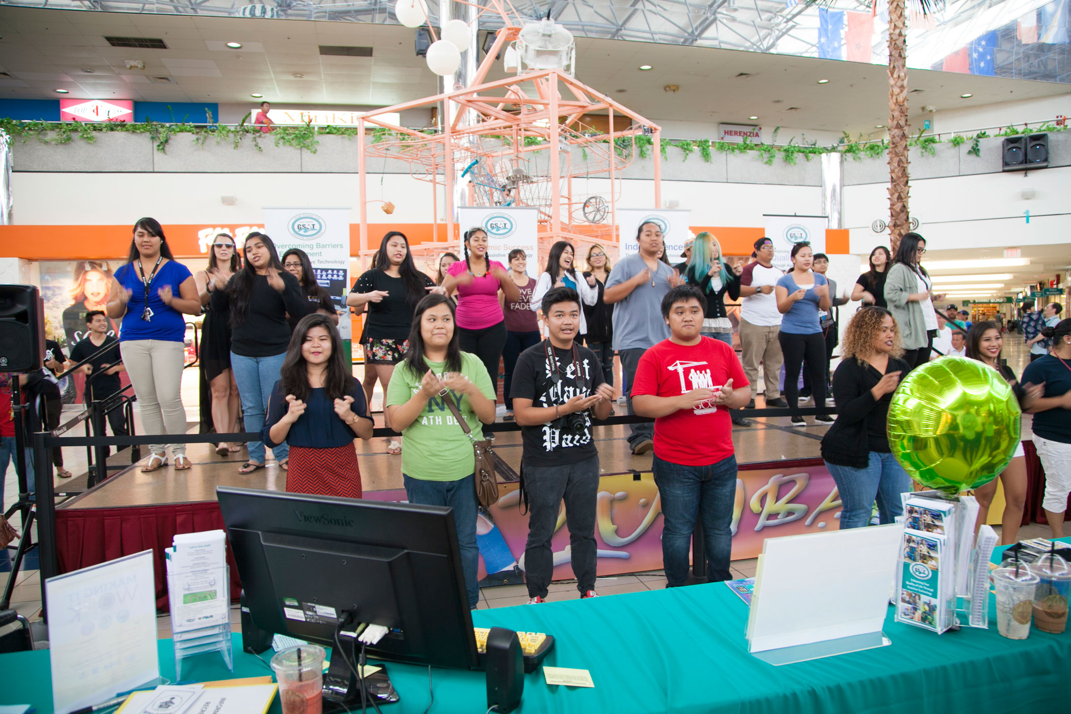 Photo of members of the Guam Community College American Sign Language (ASL) class performing.